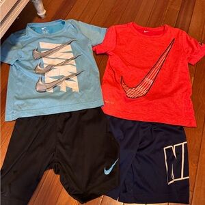 Nike Blue Dri-FIT Shirt and black Nike shorts. Red Nike shirt with blue shorts.